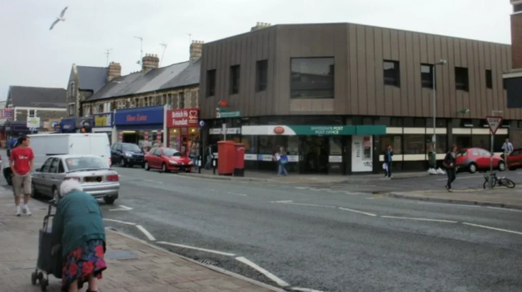 How does the local economy and housing market function in Roath?