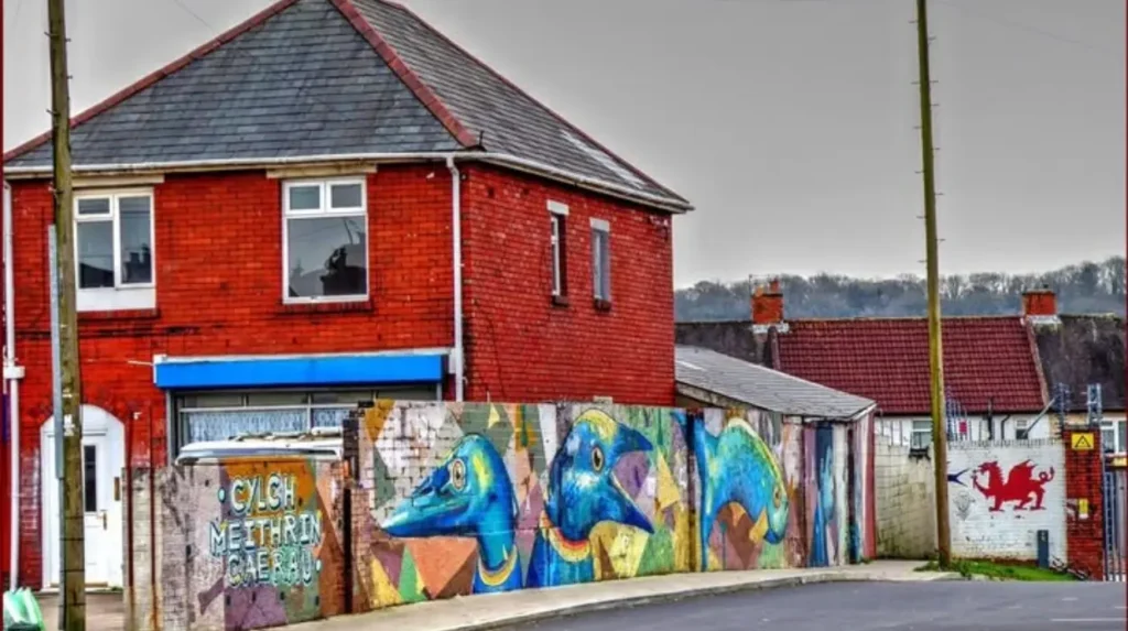 Which major retail and DIY businesses operate on Cowbridge Road West?