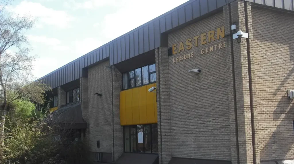 What are the main community centres and hubs serving Rumney?