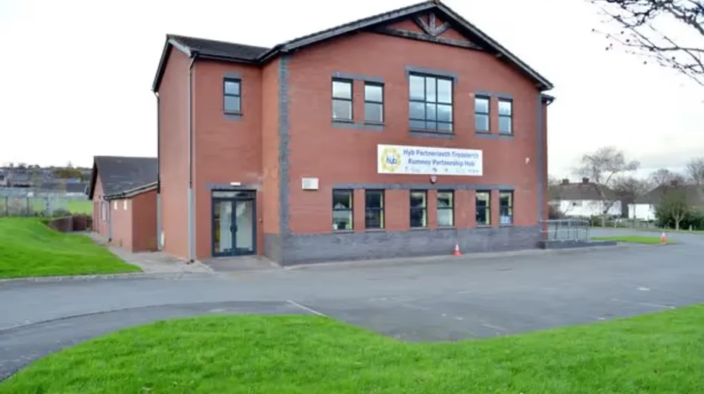 What should residents check before visiting a Rumney community venue?